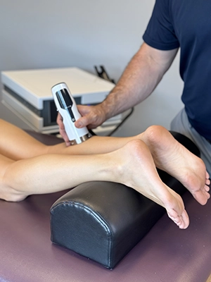 Chiropractor Wilmington NC Rhett King ShockWave On Upper Calf