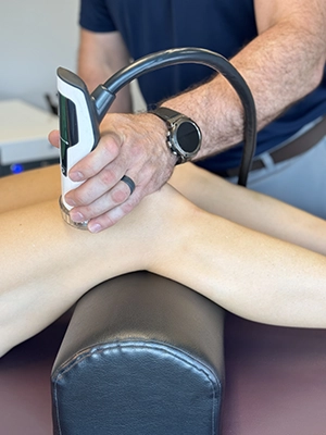 Chiropractor Wilmington NC Rhett King ShockWave On Upper Knee