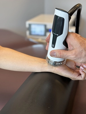 Chiropractor Wilmington NC Rhett King ShockWave On Wrist